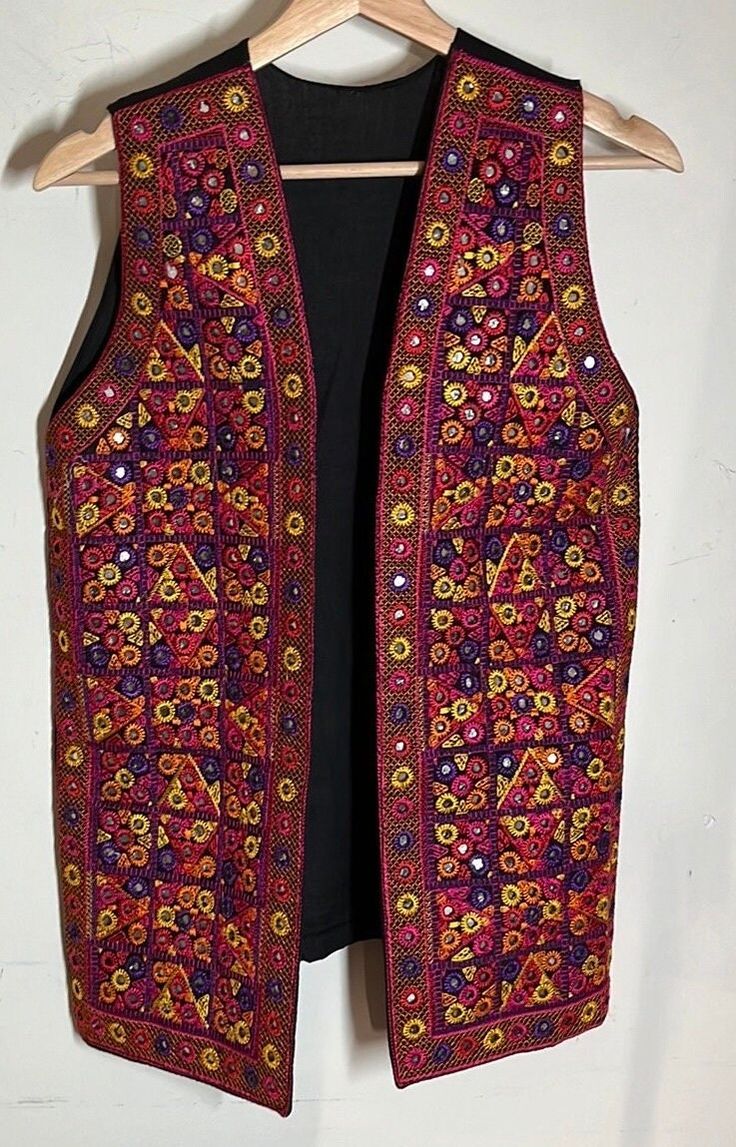 Heavier weight open front vest - Pit to pit 17" / length(shoulder to bottom) 26" / smoke-free environment / no issues / hardly used it at all (W) Multicolor Hippie Festival Vest, Sleeveless Vest For Fall Festival, Red Vest For Fall Festival, Embroidered Sleeveless Vest For Festival, Embroidered Festival Vest, Sleeveless Winter Vest For Festivals, Traditional Red Vest For Festival, Bohemian Embroidered Vest For Festivals, Hippie Style Vest For Fall Festival