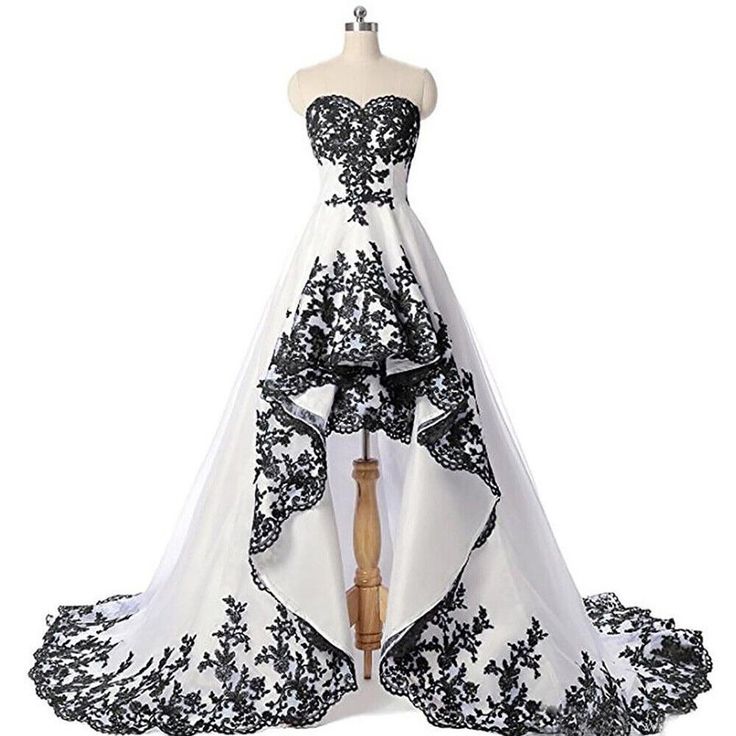 a black and white wedding dress on a mannequin