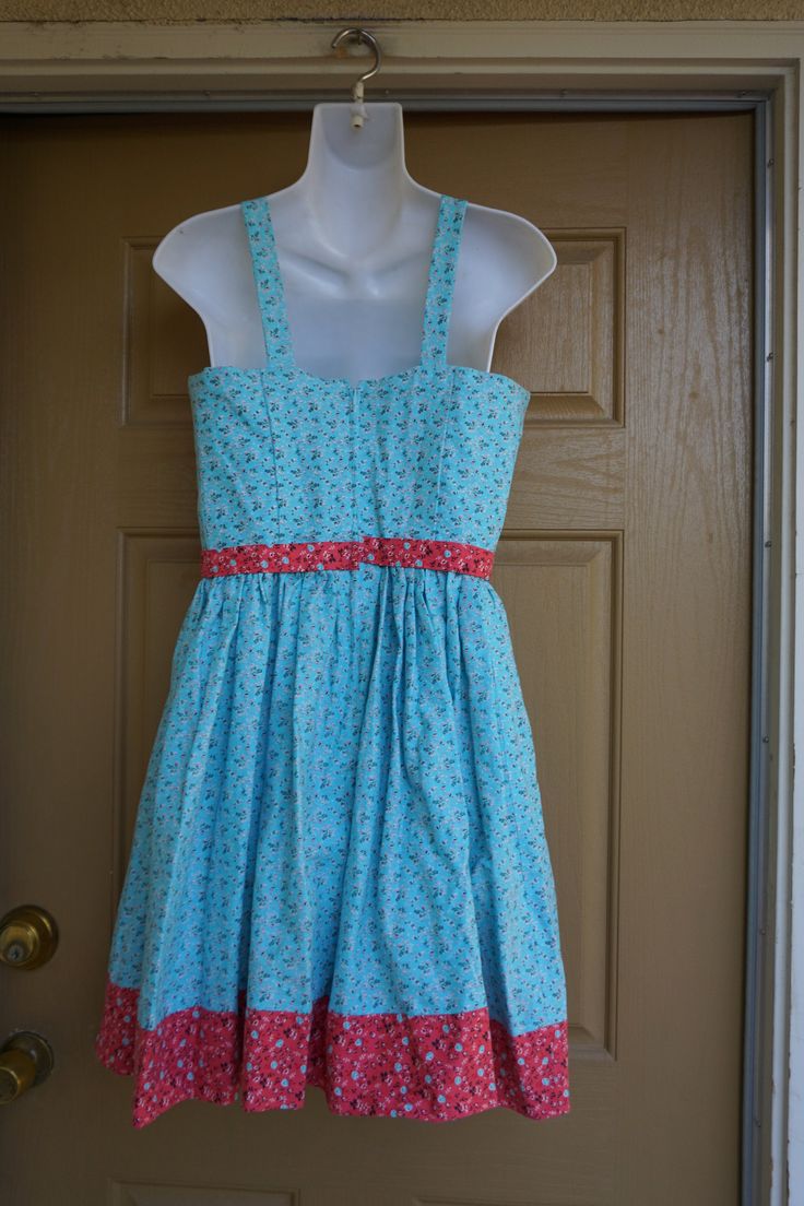 "Cute floral wench dress. Hand made. Zips in the back. In very good condition. No tags - please see measurements. Estimated size Small to Medium. Measurements taken across front laid flat 17\" across front armpit to armpit 14\" across front of waist (ties tighter) 36\" length shoulder to bottom" Cotton Sundress With Fitted Bodice, Spring Sleeveless Prairie Dress, Peasant Sleeveless Dresses For Spring, Peasant Style Sleeveless Summer Dress, Sleeveless Peasant Dress For Spring, Sleeveless Peasant Summer Dress, Spring Sleeveless Peasant Dress, Summer Sleeveless Peasant Dress, Peasant Cotton Dress For Garden Party