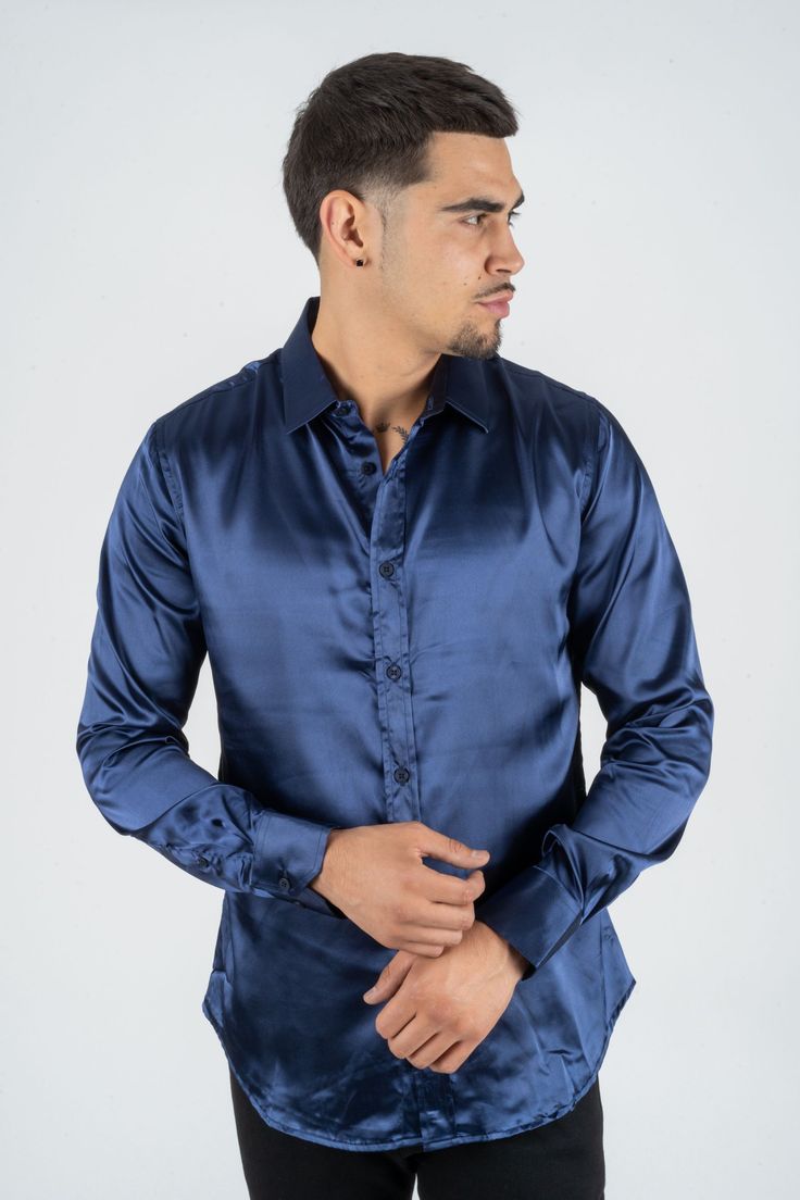 Fabric: Satin Fit: Relaxed fit About: This solid-colored satin dress shirt from Platini Jeans will enhance your fashionable wardrobe. The head-turning color adds flair to the classic long sleeve shirt. A relaxed fit delivers sleek style, and the point collar provides a modern finishing touch. Details & Features: Satin Point Collar Long sleeve Button closure Modern Fit Machine Washable Classic style Solid Color Long Sleeve Shirt For Night Out, Semi-formal Fitted Satin Shirt, Fitted Satin Shirt With Spread Collar, Classic Semi-formal Satin Shirt, Classic Satin Shirt For Semi-formal Occasions, Long Sleeve Satin Shirt For Night Out, Classic Satin Shirt, Sleek Fitted Satin Shirt, Fitted Long Sleeve Satin Shirt