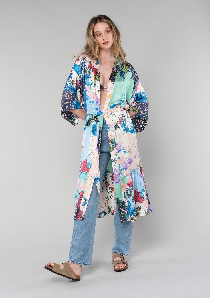 [Color: Ivory/Grey] A front facing image of a blonde model wearing a soft and silky bohemian lounge duster kimono robe in a multi color floral patchwork print. With half length kimono sleeves Spring Robe With Patchwork And Kimono Sleeves, Spring Bohemian Patchwork Robe, Bohemian Patchwork Robe For Spring, Multicolor Patchwork Robe For Spring, Multicolor Summer Robe With Patchwork, Multicolor Patchwork Robe For Summer, Multicolor Patchwork Summer Robe, Multicolor Patchwork Robe With Kimono Sleeves, Multicolor Patchwork Summer Kimono