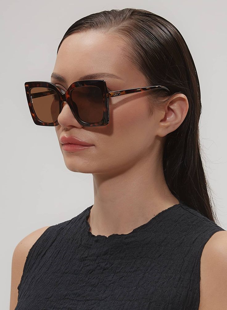 OVERSIZED SQUARED SUNGLASSES IN BROWN TORTOISESHELL PRODUCT DETAILS Frame: Oversized Squared Color: Tortoiseshell Lens: Brown #CAT3 100% UV Protection Comes with a Soft Cream Vegan Case SIZE CM INCHES FRAME WIDTH 14.5 CM 5.7" FRAME HEIGHT 5.9 CM 2.3" LENS WIDTH 5.6 CM 2.2" LENS HEIGHT 4.8 CM 1.9" Trendy Tortoiseshell Sunglasses With Mirrored Lenses, Square Tortoiseshell Sunglasses For Summer, Tortoiseshell Square Sunglasses For Summer, Modern Tinted Sunglasses For Fall, Modern Tinted Lenses Sunglasses For Fall, Modern Brown Sunglasses For Fall, Summer Tortoiseshell Square Sunglasses, Trendy Tortoiseshell Sunglasses For Vacation, Chic Rectangular Tortoiseshell Sunglasses