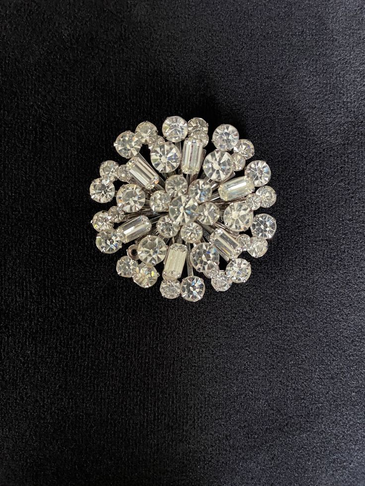 1950's Hollywood Regency, Large Super Sparkly Clear Faceted Glass Prong Set Round & Bagette Rhinestones Brooch, Excellent VTG Condition. Silver Tone Metal, Swedged, Layered Mid Century Construction, Roll Over Clasp. c. 1950's Please read all descriptions and view all photos carefully. Please feel free to ask any questions that are not addressed on my policy page or in above description. I am happy to help. Thank you for wandering around my shop. I hope you enjoyed your visit and come back often, as I am continuously adding new items. Vintage Rhinestone Brooches For Vintage Events, Vintage Rhinestone Brooches For Party, Vintage Rhinestone Party Brooches, Vintage Evening Brooches With Rhinestones, Vintage Rhinestone Brooches For Evening, Retro Wedding Brooches With Rhinestones, Vintage Crystal Brooches For Formal Occasions, Vintage Crystal Embellished Brooches For Formal Events, 1950s Hollywood