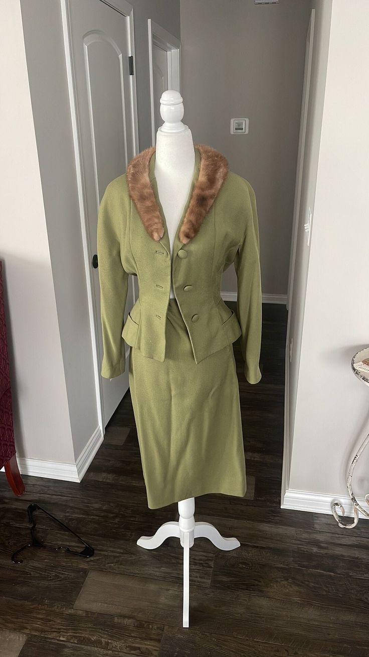 This is a vintage item. A few small holes & stains throughout.  Blazer is fully lined. Skirt is partially lined. Measurements are approx.  Blazer  Bust: 34" Waist: 24" Skirt  Waist 23" 1940s Skirt Suit, Vintage Skirt Suit For Semi-formal Fall Occasions, Vintage Fitted Pleated Skirt, Classic Fitted Green Skirt Suit, Fitted Vintage Mini Skirt, Retro Fitted Skirt Suit, Classic Green Fitted Skirt Suit, Vintage Fitted Long Sleeve Skirt Suit, Vintage Fitted Skirt Suit With Long Sleeves