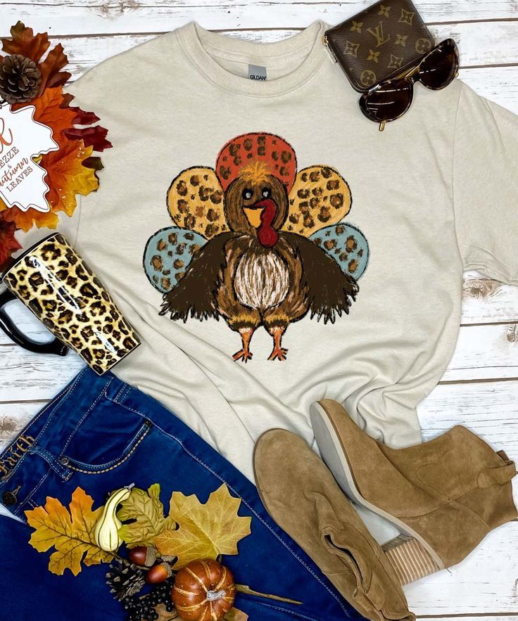 Gobble til you Wobble and add a little fun to your Thanksgiving activities with our Turkey with Leopard Feathers graphic tee shirt! This tee is offered in short or long sleeve options. Makes the perfect Thanksgiving graphic tee! Funny Thanksgiving Shirts Zazzle, Fun Short Sleeve Tops For Fall, Cute Fall Crew Neck Shirt, Fall Funny Print Short Sleeve Tops, Cute Crew Neck Fall Shirt, Cute Crew Neck Shirt For Fall, Funny Print Short Sleeve Tops For Fall, Cute Short Sleeve Fall Shirt, Cute Short Sleeve Shirt For Fall