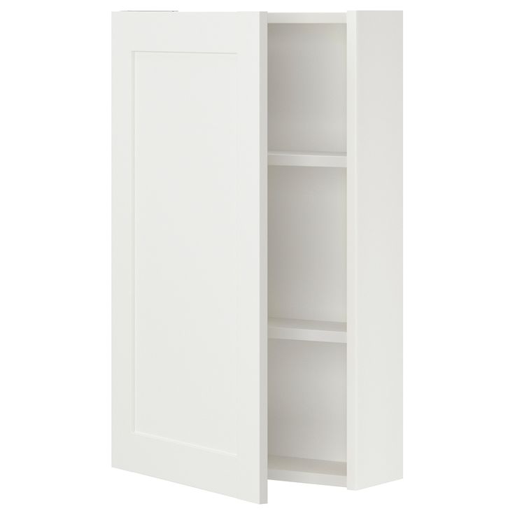 a white cabinet with two doors and shelves