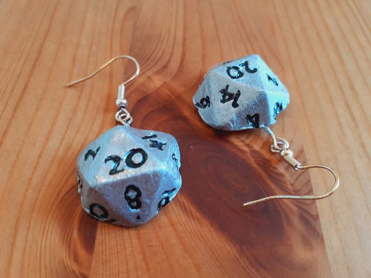 Different kinds of jewelry decorated with a hand painted clay part of a D20 die. Painted Clay, Different Kinds, Wedding Jewelry Earrings, Super Glue, Christmas Wrapping Paper, Christmas Wrapping, Wedding Earrings, Dress Pattern, Denmark