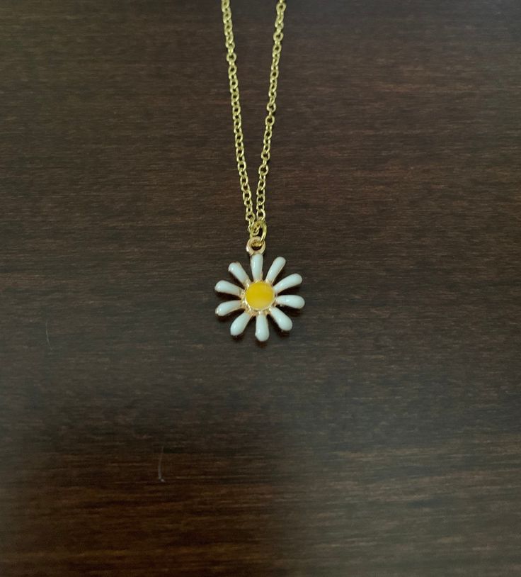 Dainty Yellow Flower Shaped Jewelry, Cute Gold Jewelry With Flower Charm, White Flower Jewelry With Sunflower Design, White Flower-shaped Jewelry With Sunflower Design, White Sunflower Design Flower Jewelry, Yellow Flower Shaped Jewelry With Sunflower Print, Yellow Flower-shaped Jewelry With Sunflower Print, Yellow Flower Shaped Jewelry With Adjustable Chain, Cute Gold Necklace With Flower Charm