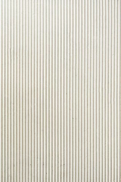 a white wall with vertical lines painted on it