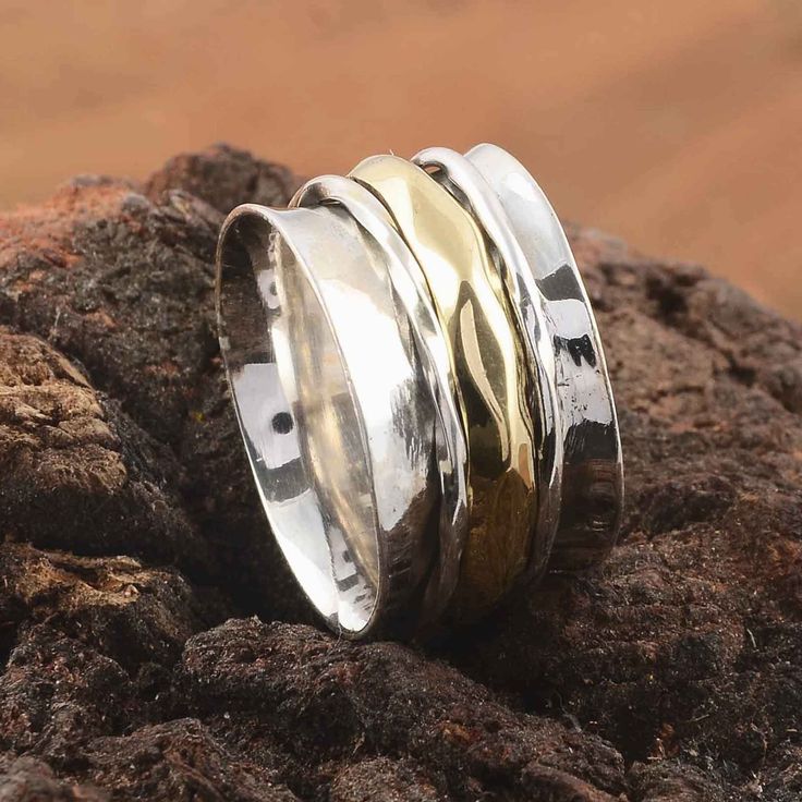 "Spinner Two-Tone Ring,925 Sterling Silver Spinner Ring, Meditation Band Spinner Ring, Handmade Thumb Spinner Ring, Boho Silver Spinner Ring ❥ Add this beautiful one little thing of galactic shine to make you feel unique and to transform your lives. Perfect for any kind of outfit and every occasion. ❥ Customers' satisfaction is our biggest priority, please contact us with any questions/queries for future or existing orders, and we will do our best to make sure you are happy with your order. ❥Ple Silver Brass Stackable Rings For Promise, Unique Silver Stackable Brass Rings, Handmade Bohemian Wide Band Ring For Anniversary, Handmade Wide Band Brass Ring, Bohemian Gold Stackable Rings In Sterling Silver, Bohemian Gold Stackable Sterling Silver Rings, Handmade Brass Wide Band Ring, Bohemian Rings With Oxidized Finish For Anniversary, Unique Handmade Brass Stackable Rings