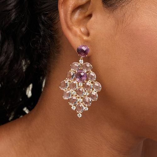 Rarities Amethyst, Rock Crystal & Zircon Chandelier Earrings  These elegant, gold-plated hanging chandelier earrings are the perfect length to accentuate your profile. Crafted from a mesh of clear rock crystal stones and topped with purple amethyst, they provide beautiful views from both front and back sides.        Approx. 2-7/16"L x 1-7/16"W     Stamped .925; 22-24K yellow gold plating     Pierced with clutch backs     Chandelier-style earrings have pear-shaped amethyst stones prong-set on post fronts     Drops comprised of rock crystal quartz stones     Each drop has single, amethyst accent     Round, white zircon accents throughout     All stones prong-set with checkerboard-cut facets   Stone Information       All sizes and weights approximate     Amethyst - Heart (10mm), round (10mm) Wedding Chandelier Earrings With Gemstone Accents, Wedding Dangle Chandelier Earrings With Gemstone Accents, Elegant Gold Amethyst Chandelier Earrings, Elegant Gold Chandelier Earrings With Amethyst, Gold Amethyst Dangle Chandelier Earrings, Amethyst Rock, Amethyst Heart, Amethyst Stones, Hanging Chandelier