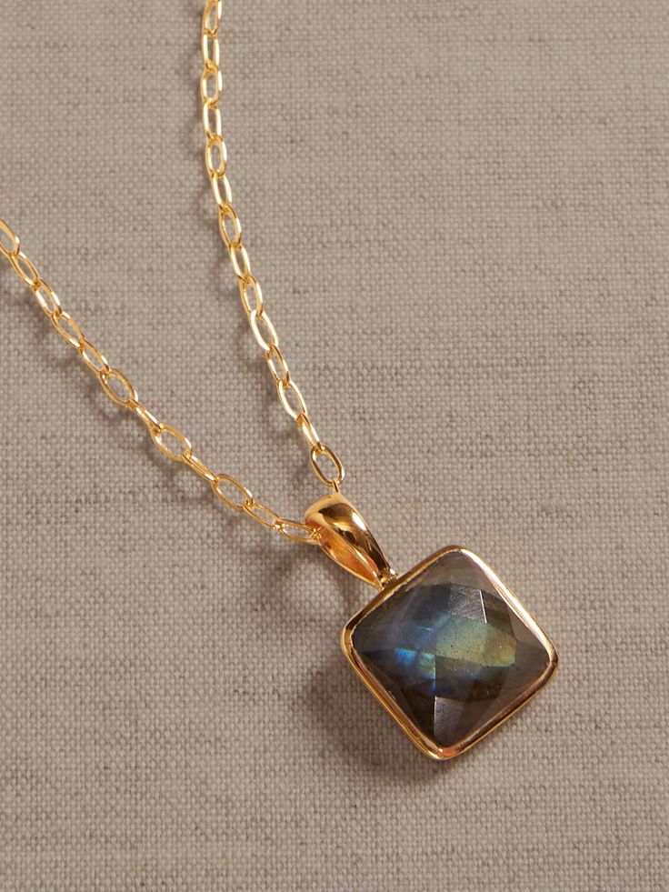 FACETED GEMSTONES: A tempting array of treasures, this collection pairs semi-precious gems with 22k gold-plated brass to highlight the stones' natural beauty and faceted cut.  Featuring brilliant labradorite, shimmering moonstone, and pearlescent pre Single Stone Pendant, Coin Frame, Brass Chain Necklace, Semi Precious Gems, Rustic Jewelry, Square Pendant, Single Stone, Women's Jewelry And Accessories, Precious Gems