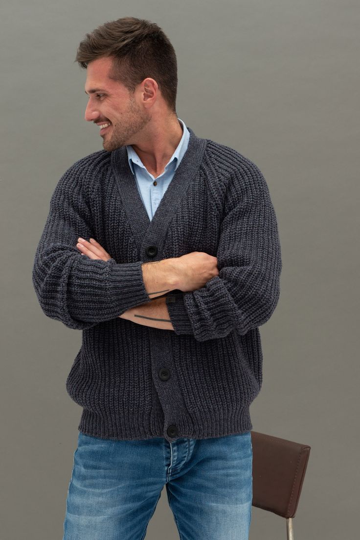 "Pure merino wool knitted mens sweater is inspired by classic Scandinavian style. Simple jumper has V neck, buttons closure. Warm and comfortable woolen sweater delivers simplicity, style and ability to wear this sweater whenever you are spending time in nature or going to the theater, restaurant with your family or friends. This year we are inviting customers to buy Christmas presents from small family businesses & stand together during this crazy time. Handmade Christmas presents will be e Handmade Christmas Presents, Woolen Clothes, Woolen Sweater, Hand Knitted Jumpers, Wool Sweater Men, Time In Nature, Woolen Sweaters, Warm Cardigan, Merino Sweater