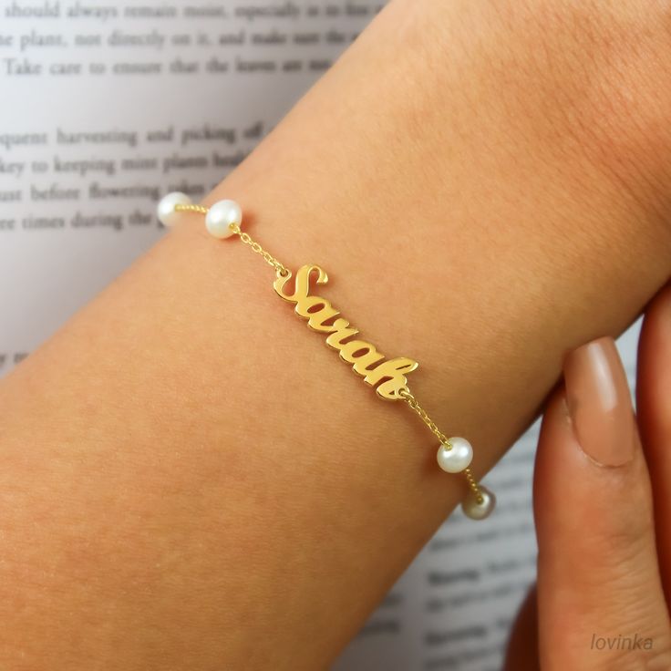 "14K Solid Gold Pearl Name Bracelet ❤️Finish:Solid Gold, Sterling Silver,14K Gold,Rose Gold HOW TO ORDER; Please select your preffered material from the menu while adding to card. Please write your custom NAME a note during check out. Comes with an Elegant gift box and all of my bracelets come with an extra 1\" extension ❤️Nickel Free ❤️Tarnish Resistant ❤️High Quality Materials T U R N ∙ A R O U N D ∙ T I M E * All items are custom made to order. Our turn around time is about 4 -6 business days. This can change during peak seasons. Please check our home page for the most current times. ❤️Please contact me for further questions and custom design jewelry. Thank you for shopping with me!!" Cheap Personalized Gold Pearl Bracelet, Elegant Gold Beaded Bracelet With Custom Name, Elegant Handmade Name Bracelet For Wedding, Customized Elegant Gold Beaded Bracelets, Customized Dainty Bracelets, Dainty Name Bracelet For Wedding, Elegant Custom Name Beaded Bracelets As Gift, Elegant Custom Name Beaded Bracelets For Gift, Elegant White Name Bracelets