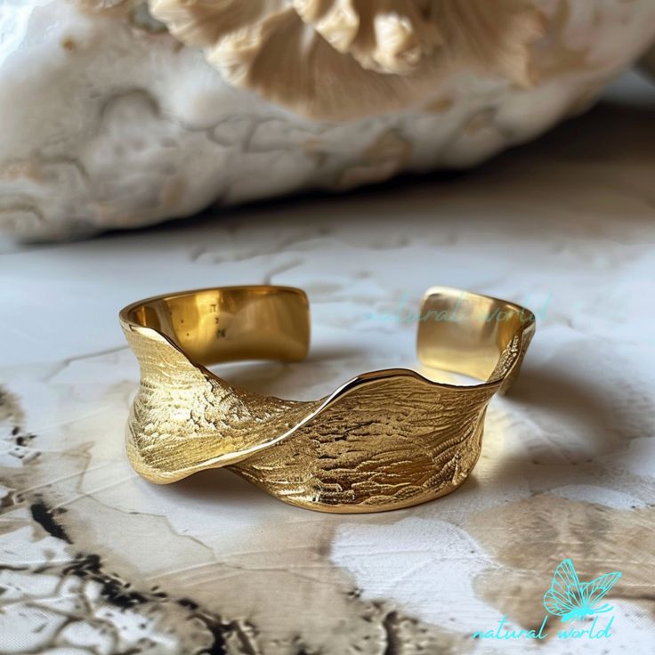 14k Gold Massive Bangle Bracelet, Thick Cuff Bracelet Gold Extra Large Bracelet, Wide Open Bangle Bracelet, Gold Chunky Bangle Bracelet 🌺Item Detail🌺 ♠️ Item Name :  Bangle Bracelet ♠️ Metal : 925 Silver ♠️ Size : Select the Variations ♠️ Width : 15mm                                                                        🌊 *About Us: Natural World Jewelry* 🐚 At Natural World Jewelry, we're passionate about bringing the serene beauty of the ocean to your everyday life. Our artisanal jewelry p Luxury Gold Hammered Bangle, Gold Bangle With Oyster Bracelet For Anniversary, Hammered Cuff Bangle As Gift, Gold Plated Yellow Gold Cuff Bracelet, Yellow Gold Plated Cuff Bracelet, Elegant Yellow Gold Brass Cuff Bracelet, Formal Yellow Gold Brass Cuff Bracelet, Luxury Hammered Bangle Bracelet, Luxury Brass Bangle Cuff Bracelet