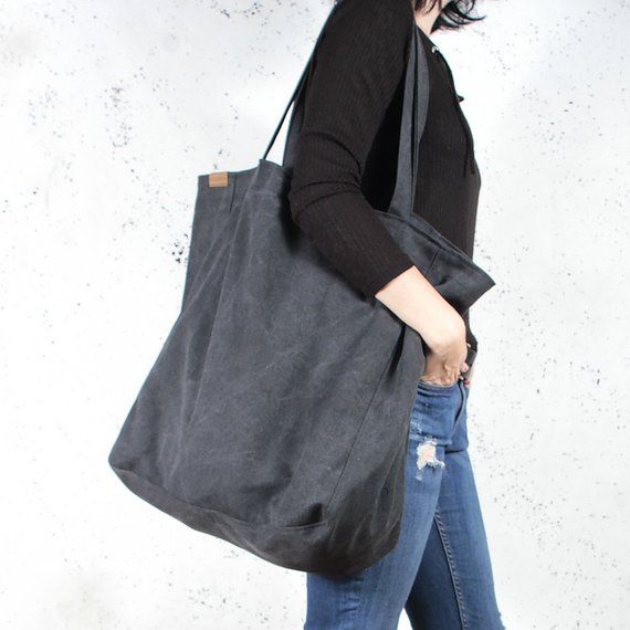 Lazy Bag is an over sized city type bag. Its simple and elegant design make it a faithful companion throughout the entire day. The bag was made using a durable cotton, resistant to wear and friction. It's also ecologically friendly and does not cause allergies. Slightly worn through (aged) texture of the fabric gives it a unique look. Lazy bag was created from a crease resistant cotton. The bag softly and freely shapes around the arm.FEATURES:handmade in Europefully zipped upinside pocket for mo Extra Large Beach Bag, Lazy Bag, Large Beach Bag, Large Beach Bags, Slouchy Tote, Everyday Tote Bag, Large Leather Tote Bag, Soft Leather Bag, Haikou