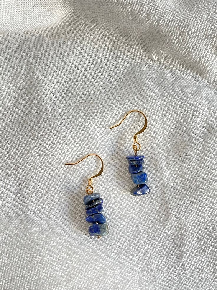 Enjoy This Pair of Dainty Blue Lapis Chip Beads each Chip having a Beautiful Variation of Color and Shape.  * Gold plated findings * Length: 1.25' Chip Earrings, Beads Earrings, Blue Lapis, Chip Beads, Beaded Earrings, Jewelry Earrings Dangle, San Diego, Dangle Drop Earrings, Dangle Earrings