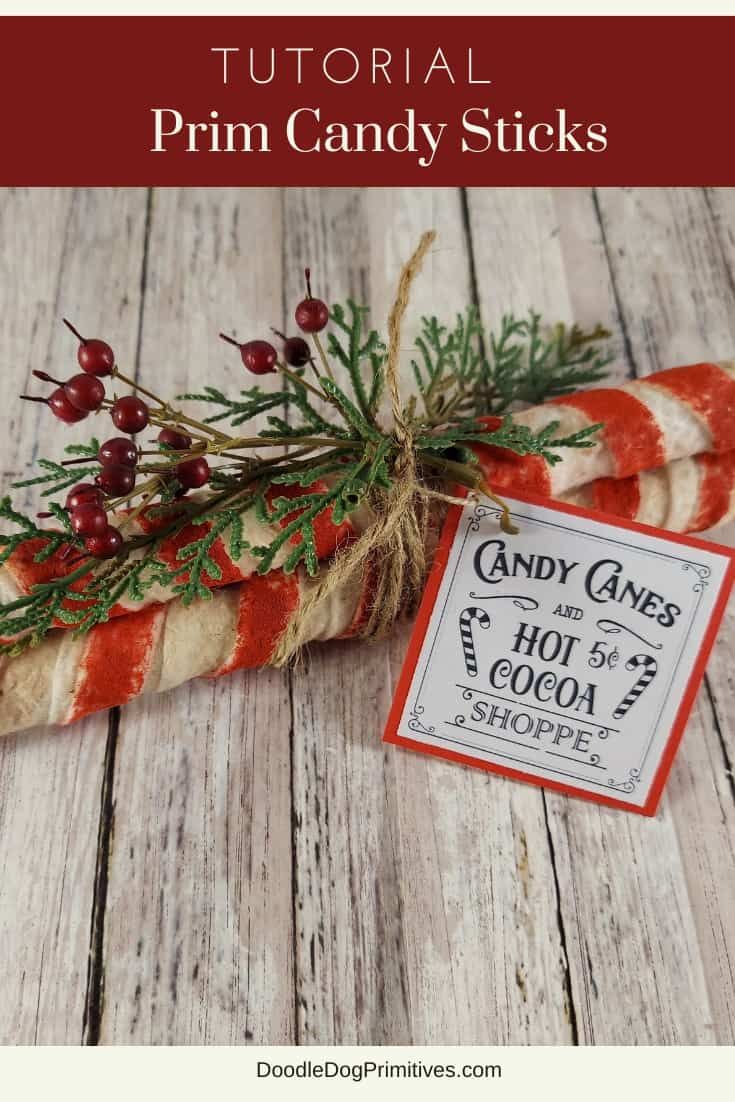 candy canes are wrapped in brown paper and tied with twine to the top