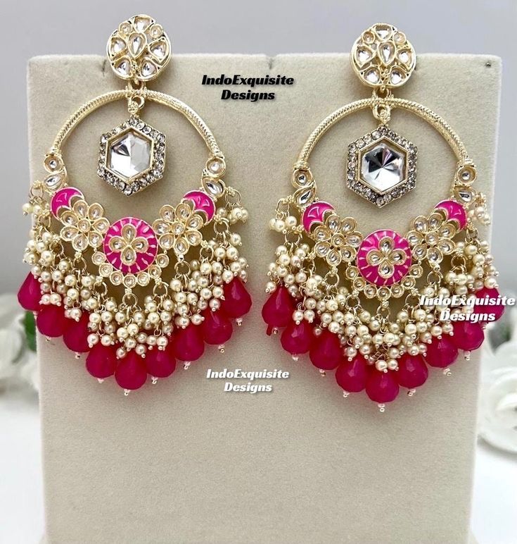 Trendy large size Kundan Statement Earrings / Indian Jewelry/ Bollywood Jewelry/ High Quality Kundan and Polki Jewelry. All items are shipped from Brampton, Ontario, Canada. If you need your item by a certain day, please reach out to us for express delivery option before placing the order so that we can update the shipping for you. Standard shipping/delivery timeline Below are the estimated delivery times after the order is shipped/dispatched.  ---> USA delivery timeline * 3-5  business days to major urban centers in USA. It may take 1-2 days extra to remote locations ---> Canada delivery timeline  * 2-3 business days - GTA  & Montreal  * 2-4  business days - Rest of Ontario/Quebec * 3-6 business days-  Rest of Canada (Please consider 1-2 extra business days to very remote locations)    -- Kundan Chandbali Beaded Earrings For Party, Bollywood Chandbali Beaded Earrings For Celebrations, Traditional Chandbali Beaded Earrings For Party, Festive Bollywood Beaded Earrings For Celebration, Elegant Beaded Drop Earrings, Festival Chandbali Beaded Party Earrings, Chandbali Beaded Earrings For Party And Festivals, Festival Chandbali Beaded Earrings For Parties, Chandbali Chandelier Earrings For Party Festivals