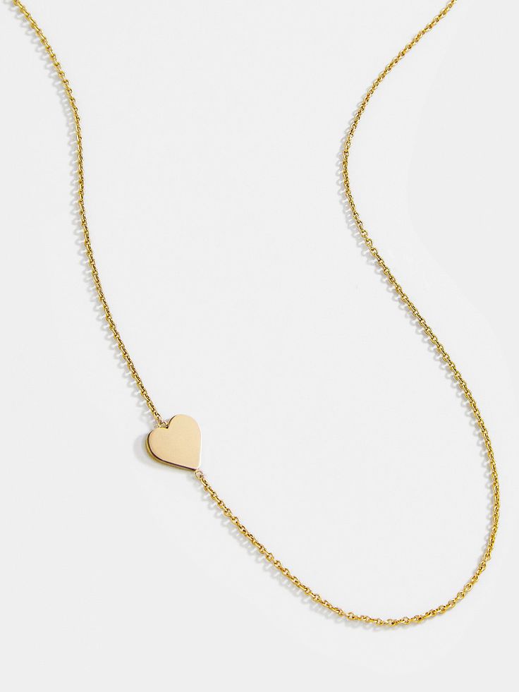 This custom designer piece is a best-seller for a reason! A dainty 14K solid gold chain is the perfect home for a bevy of customization options. Select one initial or character to truly make this layering piece your own. This everyday essential wears beautifully on its own and also pairs well with other layering necklaces. Custom Initial Necklace, Layering Necklaces, Single Letter, Solid Gold Chains, Custom Initials, Letter Pendants, For A Reason, Letter Necklace, Perfect Home