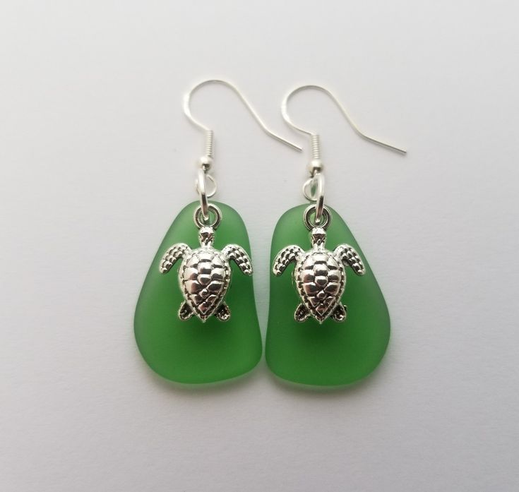 "Aloha! These design shows my love for this beautiful island of Hawaii. This item will be made to order and shipped directly from Hawaii. This is sea glass earrings with silver hooks. This handmade in Hawaii jewelry gift is from cultured sea glass that are specially formed into its shape for jewelry making. Each comes with a gift box with \"handmade by yinahawaii\" stamp and a ribbon wrapped as shown in the 2nd photo, ready to give as gift. I also offer Free gift messaging with the order. Please Green Recycled Glass Earrings For Beach, Adjustable Nickel Free Sea Glass Earrings, Nickel-free Adjustable Sea Glass Earrings, Adjustable Nickel-free Sea Glass Earrings, Adjustable Ocean-inspired Sea Glass Jewelry, Green Dangle Jewelry For The Beach, Green Ocean-inspired Nickel-free Jewelry, Adjustable Dangle Sea Glass Jewelry, Hypoallergenic Sea Glass Jewelry For Gift