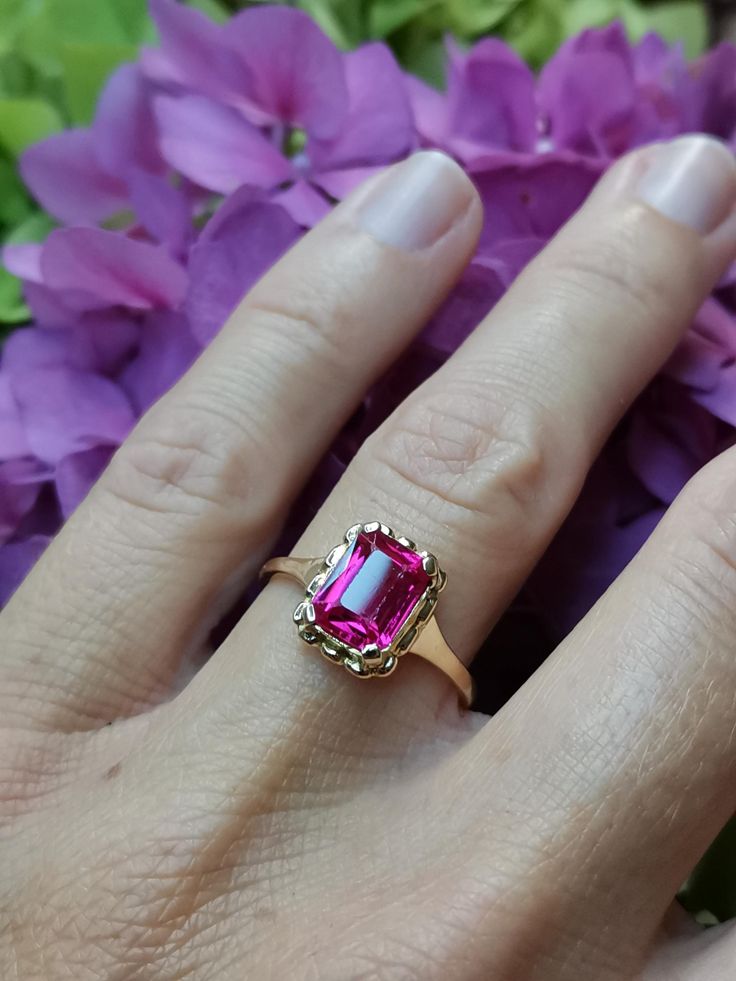 Beautiful 1930s antique German 14k gold ring with ruby, stone measures approx. 6 x 8 mm, princess cut approx. 1.5ct, ruby has few minor chips barely visible without jeweler loupe. US Size 6 3/4, in good vintage condition. Box on the photos not included! Material: 14k gold, ruby total weight: 2.4 g US Size: approx. 6 3/4 (EU size 54) Emerald Cut Ruby Ring In Gold, Heirloom Emerald Cut Solitaire Birthstone Ring, Elegant Emerald-cut Solitaire Ruby Ring, Classic Radiant Cut Ruby Ring For Anniversary, Classic Wedding Ruby Ring With Radiant Cut, Formal Radiant Cut Ruby Ring With Center Stone, Hallmarked Rectangular Ruby Ring For Formal Occasions, Classic Ruby Promise Ring With Radiant Cut, Classic Pink Ruby Ring For Formal Occasions