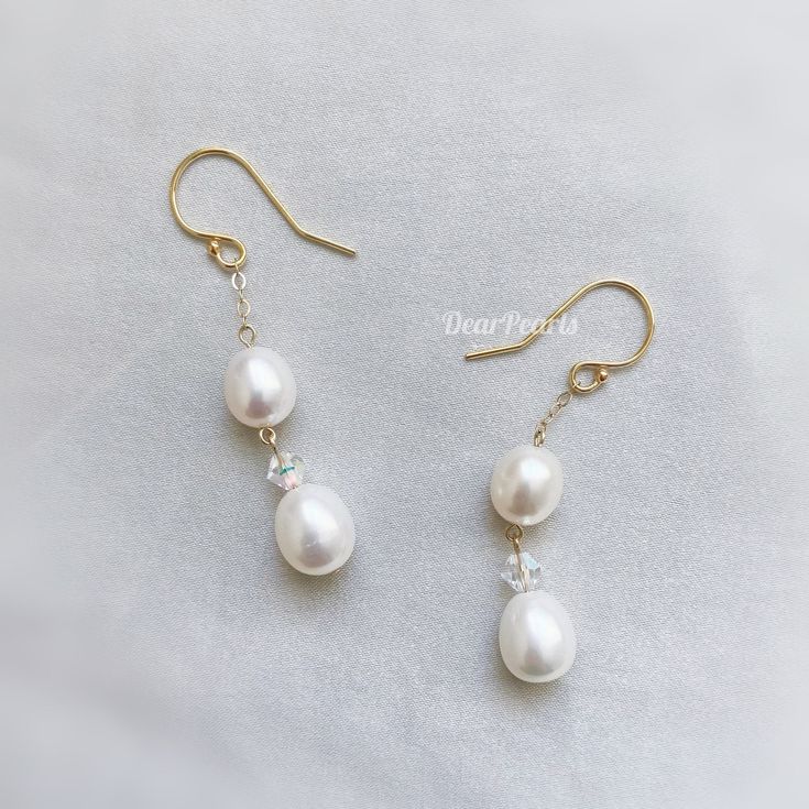 "The earrings are made with 7mm and 9mm shinny teardrop freshwater pearls and they are absolutely stunning. It is a great choice for attending weddings, parties and all kinds of special occasions. It is unique, well made and can match basically any clothes in the wardrobe adding a bit charm and elegance to the whole look. ❤︎ Material: 14K Gold Filled ❤︎ Gemstone: Genuine freshwater pearls/ Manmade Crystals ❤︎ Pearl Size: 7 mm ( 0.28 in）& 9 mm ( 0.35 in） ❤︎ Earring Length: 4.2 cm ( 1.65 in） ❤︎ Dr Hypoallergenic Pear-shaped Wedding Earrings, Dainty Teardrop Pearl Earrings For Anniversary, Dainty Teardrop Bridal Earrings For Anniversary, Hypoallergenic Teardrop Pearl Earrings For Anniversary, Hypoallergenic Teardrop Pearl Earrings For Anniversaries, Pearl Bridal Earrings With Ear Wire For Anniversary, Dainty Pearl Drop Teardrop Earrings For Anniversary, Pear-shaped White Bridal Earrings For Anniversary, Pear Shaped Hypoallergenic Pearl Wedding Earrings