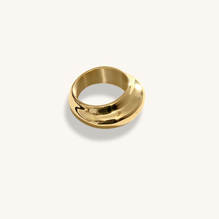 Introducing the Jamie Ring, plated with exquisite 18K gold and featuring a beautifully smooth band design. This ring is a charming accessory for any occasion, boasting a subtle and delicate allure. Create your own unique stacking style by pairing the Jamie Ring with your other favorites. Whether worn solo for a minimalist touch or stacked with other rings for a bolder statement, this ring adds a touch of elegance to any ensemble. Stainless Steel, plated with 18K Gold Width: 9mm Waterproof (Tarni Band Design, 18k Gold, Create Your, Create Your Own, Plating, Stainless Steel, Band, Ring, Gold