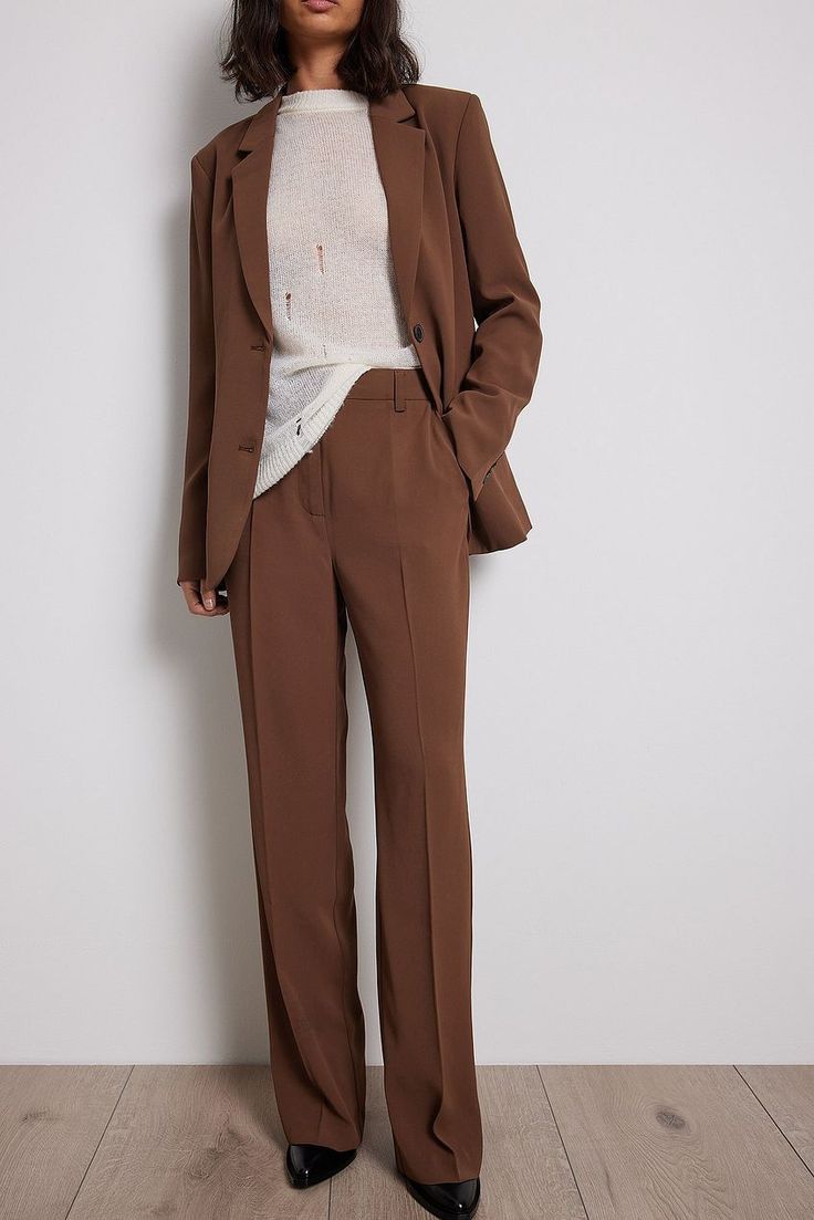 These suit pants feature a high waist with a zipper, hook and button closure. They have a belt loop and straight legs. These suit pants feature side slanting pockets and a back mock pocket. Inseam length in size 36: 81 cm / 31.88 in. Tailored Wide Leg Pants With Pockets For Office, Fall Office Suits With Straight Pants, High Waist Office Pantsuit With Pockets, Solid Straight Pantsuit For Fall, Brown Ankle-length Dress Pants For Work, Fall Solid Pantsuit With Straight Pants, Brown Ankle-length Work Pants, Solid Color Fall Pantsuit With Straight Pants, Fall Season Solid Color Straight Pantsuit