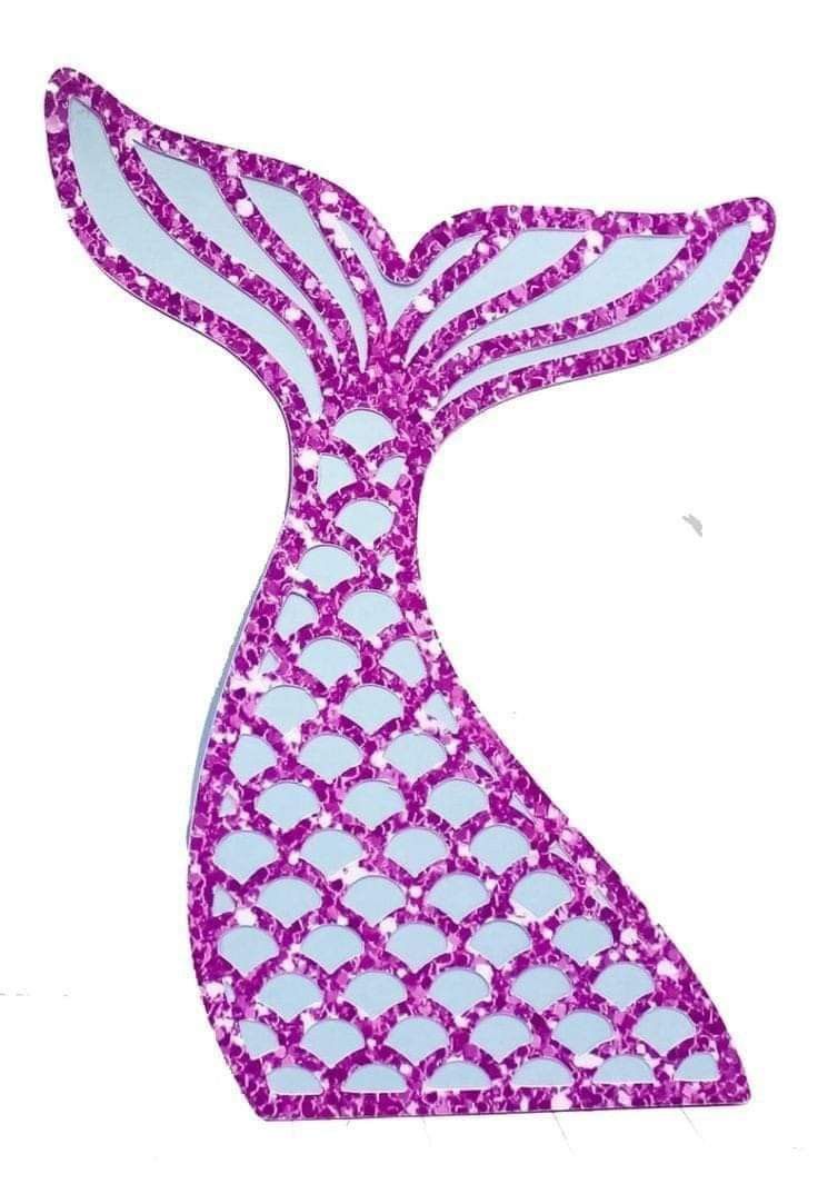 a pink mermaid tail shaped object with purple sequins on the bottom and sides