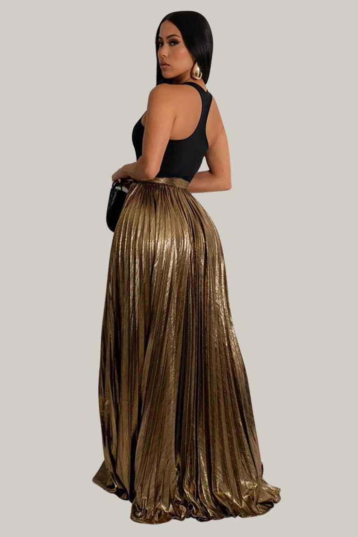 Indulge in luxury with our Artistic Allure Metallic High Slit Skirt. With its pleated design and thigh-high split, this A-line style exudes elegance and sophistication. Its natural waistline and long length create a flattering silhouette, while the medium stretch knitted fabric provides comfort and versatility. Perfect for any party or special occasion, this skirt is a must-have for those who appreciate high-end fashion. 95% Polyester, 5% Elastane Model is wearing size small Please allow 3-5 bus Bandage Jumpsuits, Gold Skirt, Black Hot Pink, Plus Size Jumpsuit, Plus Size Shopping, Christmas 2024, Fashion Items, High End Fashion, Bandage Dress