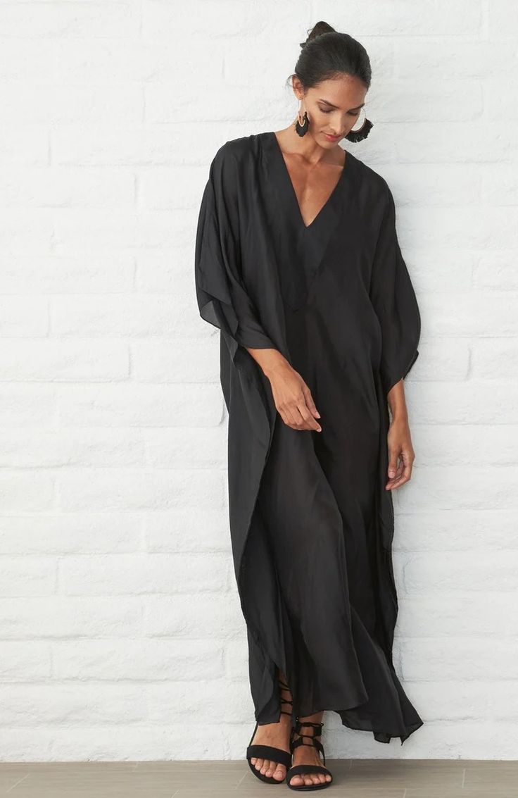 Placket Long Caftan - Women's V Neck Silk Dress – ocean+main Chic Tunic Maxi Dress For Loungewear, Chic Long-sleeved Kaftan With Relaxed Fit, Chic Long Sleeve Kaftan With Relaxed Fit, Chic Long Sleeve Relaxed Fit Kaftan, Black V-neck Kaftan For Loungewear, Chic Oversized Kaftan For Beach Cover-up, Chic Relaxed Fit Tunic Maxi Dress, Chic Relaxed Fit Kaftan, Chic Maxi-length Kaftan For Loungewear