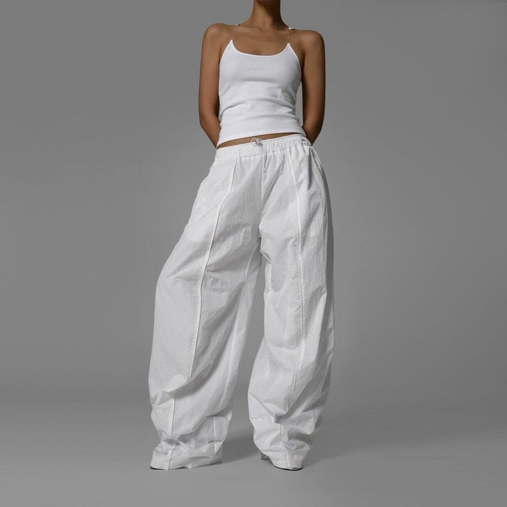 Product details: Waist 66 cm/ 25.98 in Hip 118 cm/  46.46 in Product length 115 cm/ 45.27 in Elastic waist  Wide  One size  Pockets  Lined  100% polyester White Baggy Casual Harem Pants, White High Waist Cargo Pants For Streetwear, High Waist White Cargo Pants For Streetwear, White High-waisted Relaxed Fit Harem Pants, Spring White Loose Fit Harem Pants, Spring White Loosely Fitted Harem Pants, White Baggy High Waist Harem Pants, White Cotton Relaxed Fit Harem Pants, White High Waist Baggy Harem Pants