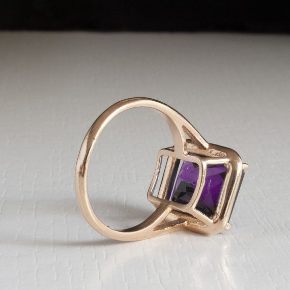 An Absolutely gorgeous Purple Amethyst Gold ring. Featuring a Prong set 6.5 Carat 10 x 12 Purple Amethyst Gemstone. The color is simply amazing as well as the clarity, This is a Grade AAA Gemstone.  When i saw the beauty of this gemstone i had to have it, I simply had to buy a few and make a few rings with them i could not escape its beauty!  Each ring is hand made to your order from start to finish with the utmost attention to details, service and finish. We only have a few of these marvelou... Formal Purple Amethyst Ring With Rectangular Shape, Formal Rectangular Purple Amethyst Ring, Formal Rectangular Amethyst Ring, Classic Purple Rectangular Rings, Rectangular Amethyst Ring With Accent Stones, Purple Rectangular Gemstone Ring, Rectangular Purple Rings With Accent Stones, Formal Purple Rings With Rectangular Stone, Rectangular Amethyst Wedding Rings