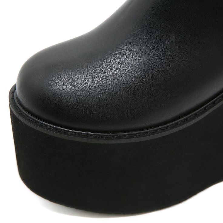 Outer material: microfiber Sole Material: Rubber Toe shape: round toe Heel shape: thick heel Wearing style: side zipper Heel measures approximately: 4.5 in / 11.5cm Platform: 3 in / 7.5cm Material: Vegan Leather Color: Black Platform Boots With Zipper Closure, Punk Style Synthetic Platform Boots With Round Toe, Edgy Platform Boots With Thick Bottom And Round Toe, Edgy Platform Boots With Thick Sole, Faux Leather Platform Boots With Chunky Platform, Streetwear Platform Boots With Zipper And Round Toe, Trendy Black Wedge Boots With Chunky Platform, Trendy Black Chunky Platform Wedge Boots, Polyurethane Platform Boots For Streetwear