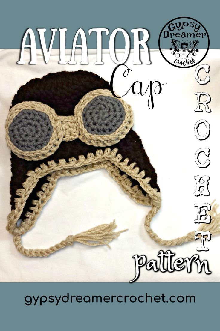 a crocheted hat with goggles on it