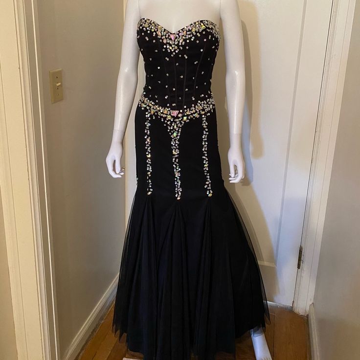 Beautiful Black Evening Gown With Rhinestones And Bustier Design. We Do Not Guarantee That All Rhinestones Are There. New Without Tags. All Sales Final Black Sparkling Dress For Wedding, Black Sparkling Wedding Dress, Fitted Rhinestone Gown For Prom Season, Fitted Rhinestone Gown For Prom, Evening Dress With Rhinestones And Fitted Bodice, Formal Evening Dress With Rhinestones And Fitted Bodice, Prom Season Rhinestone Fitted Bodice Evening Dress, Rhinestone Evening Gown For Prom Season, Rhinestone Evening Dress With Fitted Bodice For Prom