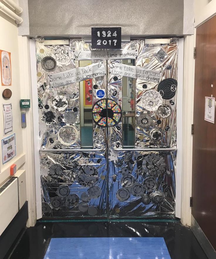 an office door decorated with lots of different types of buttons