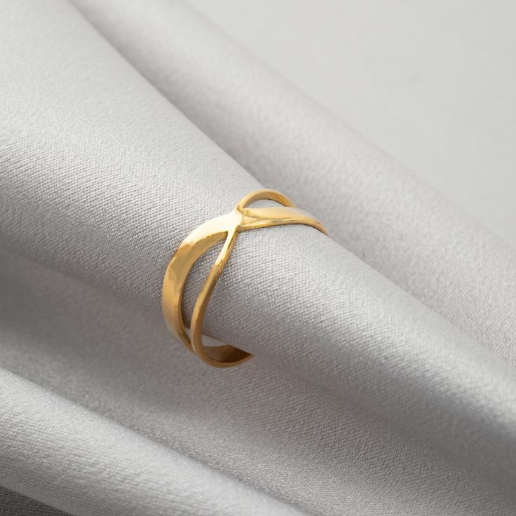 Crafted in stainless steel with excellent gold plating, totally nickel free, this ring is making a dazzling statement of its own or together with other beauties from our ring collection. Fits all sizes. Thank you for visiting our shop. Free Shipping for all orders! For more exquisite designs, shop now: www.enaena.eu Tarnish Resistant Double Band Rings For Gift, Gift Double Band Tarnish Resistant Rings, Gift Tarnish Resistant Double Band Rings, Gold Double Band Midi Rings For Anniversary, Gold Rings With A Modern Twist For Promise, Gold Stackable Rings With Open Band In Modern Style, Gold Infinity Stackable Rings As Gift, Modern Gold Wide Band Ring As Gift, Gold Infinity Jewelry