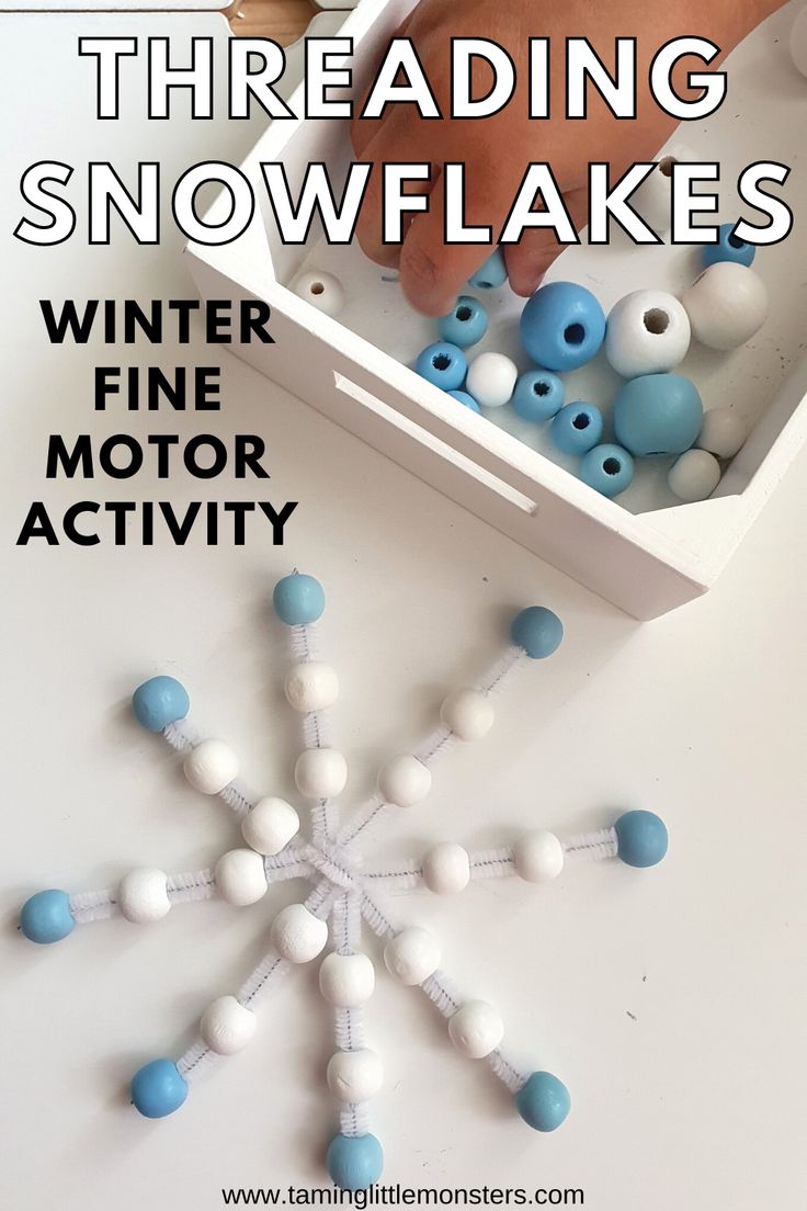 a snowflake made out of white and blue beads with text overlay reading threading snowflakes winter fine motor activity