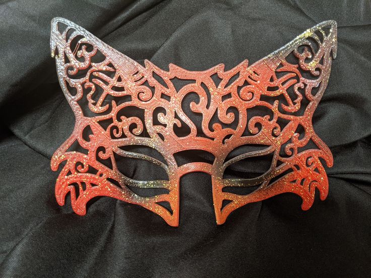 This hand-drawn designed 3d printed mask is great for Halloween, masquerade parties, renaissance fairs or just your own fun photoshoot! It's lightweight, comfortable and formed to the face. Just a touch of spirit gum keeps it in place (not included) or a ribbon tie (included.)  Available in matte, gloss, glitter, red & black, orange & black (pictured above), white & black (for an arctic fox look) or any combination of crazy colors you want. Handmade Masquerade Mask For Halloween Cosplay, Adjustable Masks For Halloween Cosplay, Handmade Fantasy Halloween Mask, Handmade Halloween Festival Masquerade Mask, Adjustable Fantasy Masks And Prosthetics For Events, Fantasy Masks For Carnival Events, Gothic Masquerade Mask For Carnival Festival, Handmade Fantasy Masks And Prosthetics For Costume Party, Gothic Eye Mask For Fantasy Events