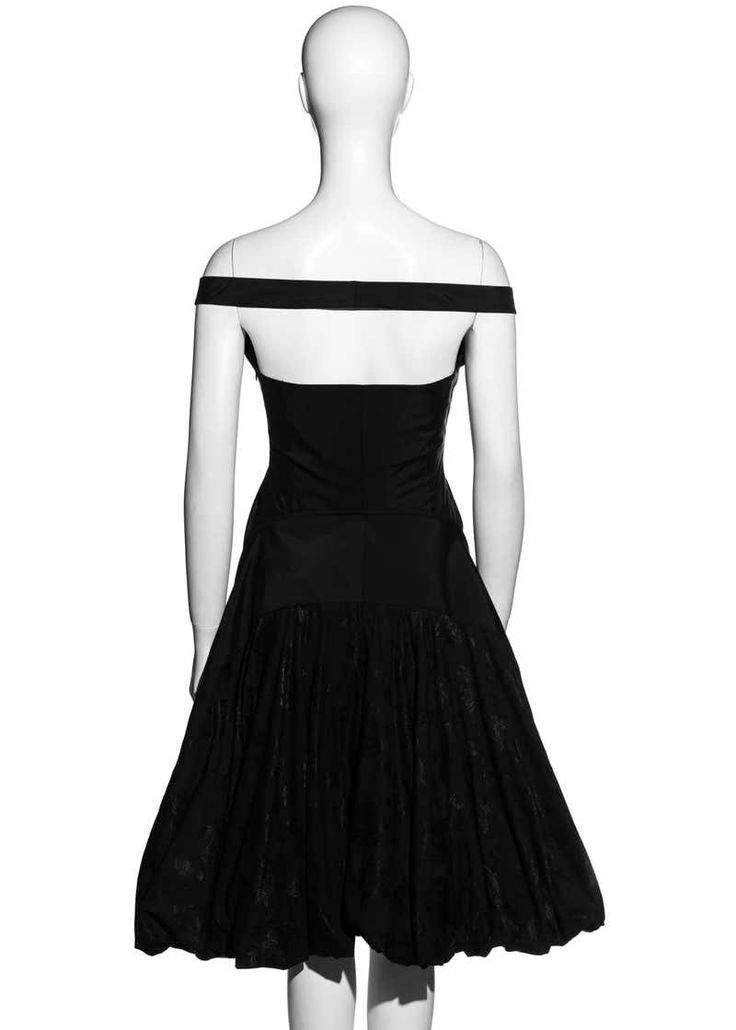 For Sale on 1stDibs - ▪ Alexander McQueen black off-shoulder mid-length evening dress ▪ 57% Cotton, 43% Polyamide ▪ Diamond cut panels around torso ▪ Floral brocade bustled Black Off-shoulder Dress With Fitted Bodice For Evening, Black Off Shoulder Dress For Evening With Fitted Bodice, Black Strapless Off Shoulder Evening Dress, Black Strapless Off-shoulder Evening Dress, Evening Off-shoulder Strapless Dress, Black Off Shoulder Dress With Fitted Bodice For Party, Fitted Midi Dress With Cutaway Shoulders For Party, Black Off-shoulder Mini Dress For Evening, Formal Black Fitted Off Shoulder Dress