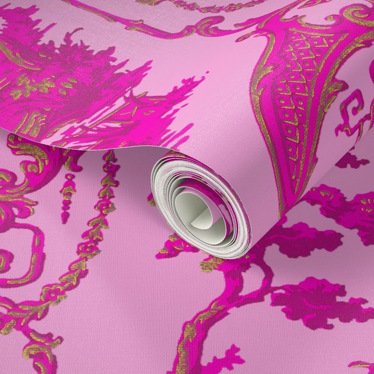 pink and gold wallpaper with an ornate design