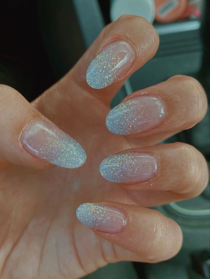 Light Blue Prom Nail Ideas, Blue Sparkly Ombre Nails, Light Blue Nails With Glitter Accent, White Nails Blue Glitter, Light Blue Nails For Hoco, Pale Blue Glitter Nails, Light Blue Prom Dress Nails, Light Blue With Silver Nails, Sky Blue Glitter Nails