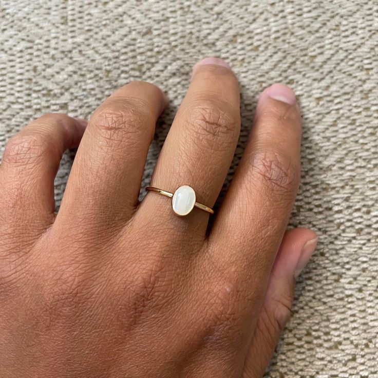 Mother of Pearl : symbolizes good luck and prosperity. Metal: Sterling Silver or 14K Gold Filled Stone: Mother of Pearl cabochon 8 x 6 mm Yellow Gold Moonstone Jewelry With Oval Shape, Oval Moonstone Yellow Gold Jewelry, Classic Gold Opal Gemstone Ring, Everyday 14k Yellow Gold Opal Ring, 14k Gold Spiritual Moonstone Ring, Yellow Gold Sterling Silver Opal Ring For Gift, Oval Gold Opal Ring In 14k Gold, Gold Round Opal Ring As Gift, Gold 14k Opal Ring As Gift