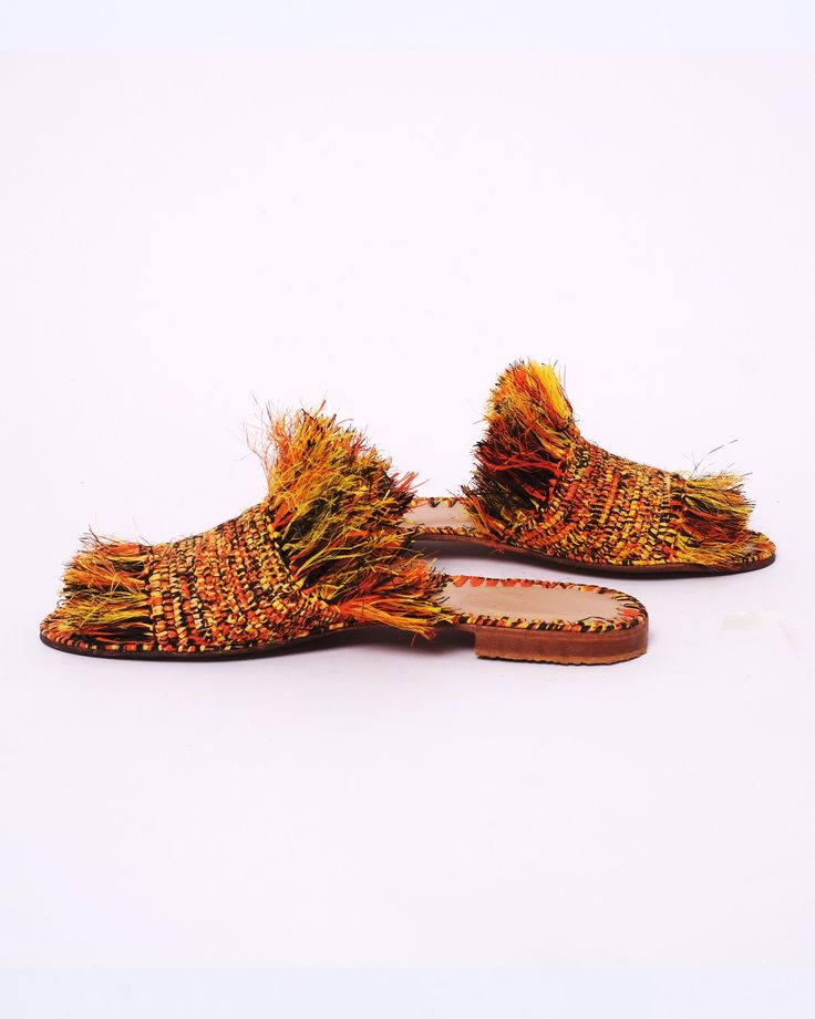 Brown Woven Sandals For Spring, Brown Woven Straw Sandals, Spring Brown Woven Sandals, Spring Woven Brown Sandals, Multicolor Slip-on Mules For Beach, Multicolor Slip-on Beach Mules, Artisan Brown Sandals For Spring, Bohemian Sandals With Woven Sole For Spring, Woven Flat Heel Mules For Vacation