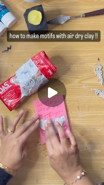 someone is making an air dry clay craft with their hands and the words how to make motivis with air dry clay