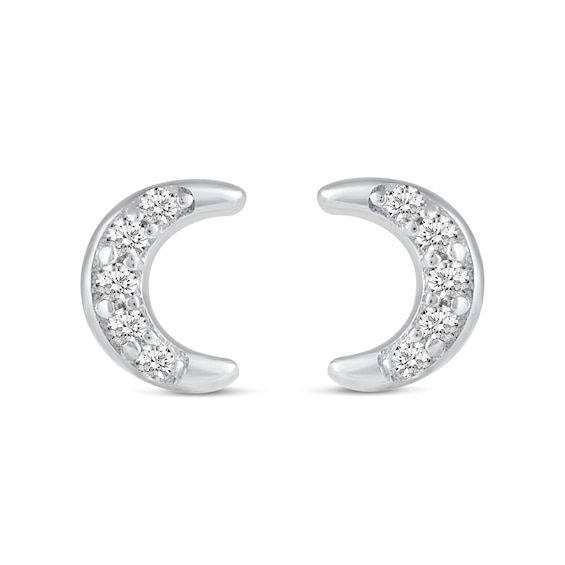 She'll love the celestial theme of this charming diamond three-pair stud earrings set. Crafted in sterling silver, this set features dainty diamond-touched earrings - one pair each of curved lightning bolts, crescent moons and four-pointed stars. Captivating with 1/10 ct. t.w. of diamonds and a bright polished shine, these earrings secure with push-screw backs. Fine Diamond Moon Shaped Jewelry, Celestial Cubic Zirconia Jewelry In Diamond White, Fine Jewelry Moon Shaped With Diamond Accents, Fine Jewelry Moon-shaped With Diamond Accents, Moon Shaped Fine Jewelry With Diamond Accents, Moon-shaped Fine Jewelry With Diamond Accents, Luxury Silver Crescent Jewelry, Elegant Crescent Diamond Earrings, Moon Shaped Single Cut Diamond Jewelry