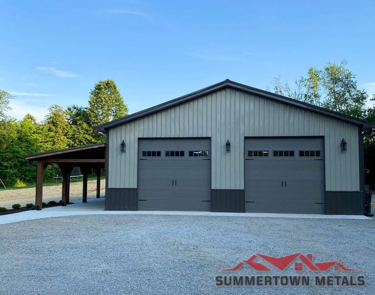 two garages with one attached to the side and another on the other, in front of