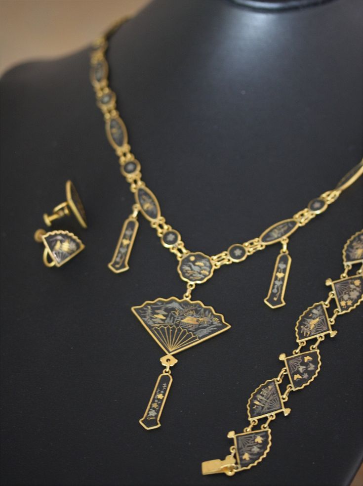 "This is truly a remarkable set in excellent vintage condition. Very nice weight and articulation. The bracelet is 7 1/2\". Earrings are screw back (typical to the age), and are 1/2\". And, the elaborately detailed necklace is 19\" with a 3\" pendant drop. Necklace is marked K24. Of similar vintage sets we have encountered, this is by far the nicest we have seen. Perfect for wear; nice enough for gifting. NOTE: We are happy to ship to our friends around the globe. Please contact us with any ques Ornate Metal Jewelry Collectible, Victorian Hand Set Gold Jewelry, Victorian Hand-set Gold Jewelry, Traditional Jewelry With Historical Design For Collectors, Vintage Ceremonial Jewelry With Historical Design, Traditional Formal Jewelry With Historical Design, Ceremonial Vintage Jewelry With Historical Design, Luxury Brass Jewelry For Ceremonial Occasions, Formal Brass Jewelry With Intricate Design